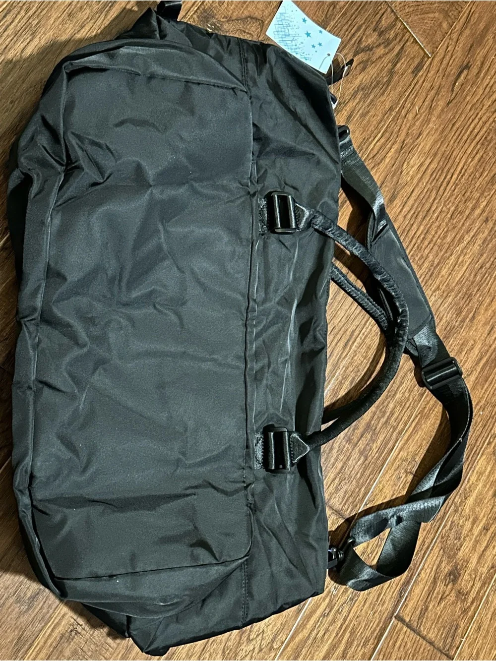 black Floless Workshop limited edition duffel bag with toiletry bag
